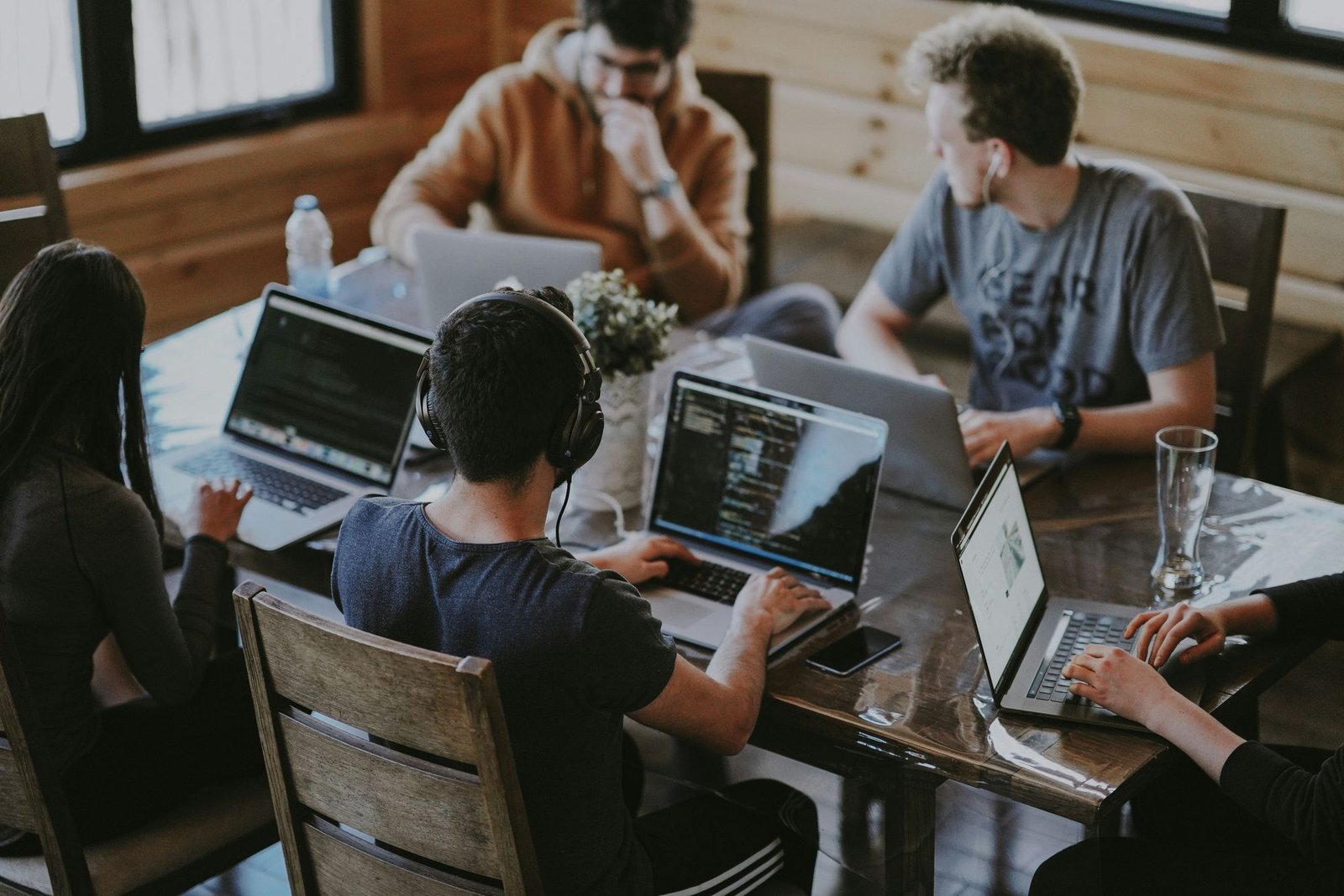 A small team working together around a table